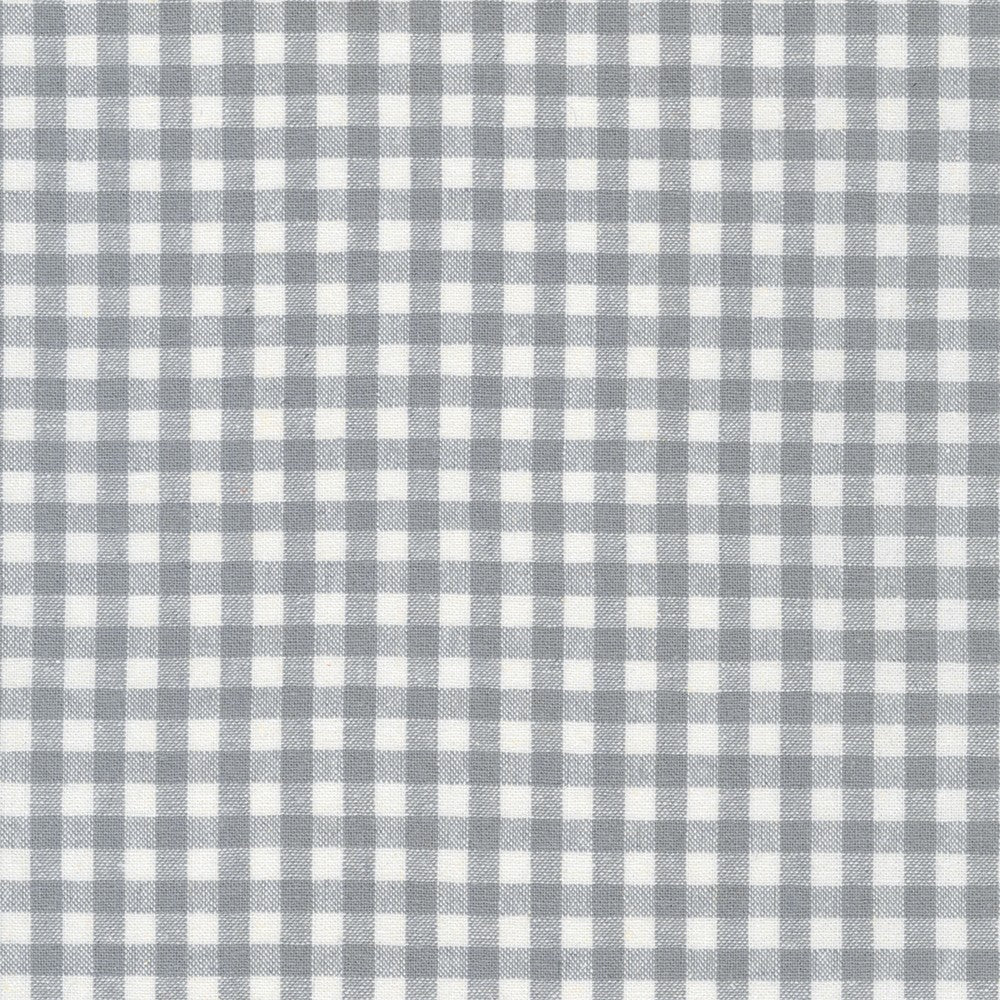 Essex Yarn Dyed Classic Wovens Steel 1/4-inch gingham linen cotton fabric by Robert Kaufman featuring a classic steel gray and natural check pattern, ideal for quilts, apparel, bags and home décor.