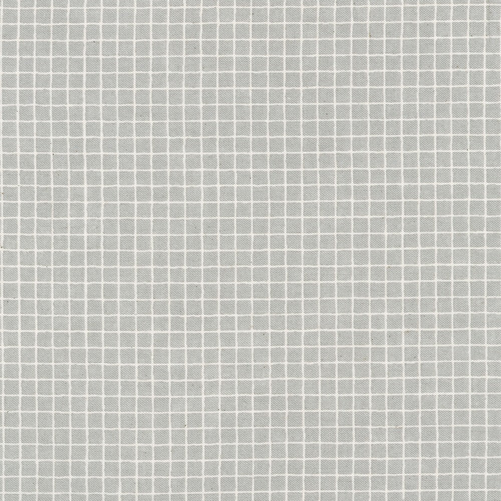Gelato Grids Gray Japanese quilting cotton fabric by Sevenberry for Robert Kaufman featuring a subtle white grid pattern on a soft gray background.