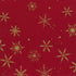 A vibrant red fabric from the Ombre Flurries Metallic collection by V and Co. for Moda Fabrics, featuring shimmering gold metallic snowflakes scattered across the surface.