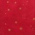 A vibrant red fabric from the Ombre Flurries Metallic collection by V and Co. for Moda Fabrics, featuring shimmering gold metallic snowflakes scattered across the surface.