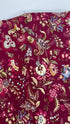 Marseille Red floral cotton fabric by Dover Hill for Benartex featuring ornate botanical flowers and foliage in burgundy, gold, cream, olive green, and blue on a rich red background.