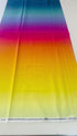 Bubblelicious Daybreak digital print fabric by Marlies Janssen for Hoffman Fabrics featuring smooth vertical ombré stripes blending navy blue, teal, lavender, magenta, coral, golden yellow, and buttery yellow on premium quilting cotton.