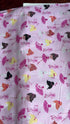Pink cotton fabric featuring tossed ballerinas, tutus, ballet shoes, and silver glitter accents by Timeless Treasures.