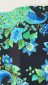 Peacock metallic cotton fabric on black background with gold accents by Timeless Treasures